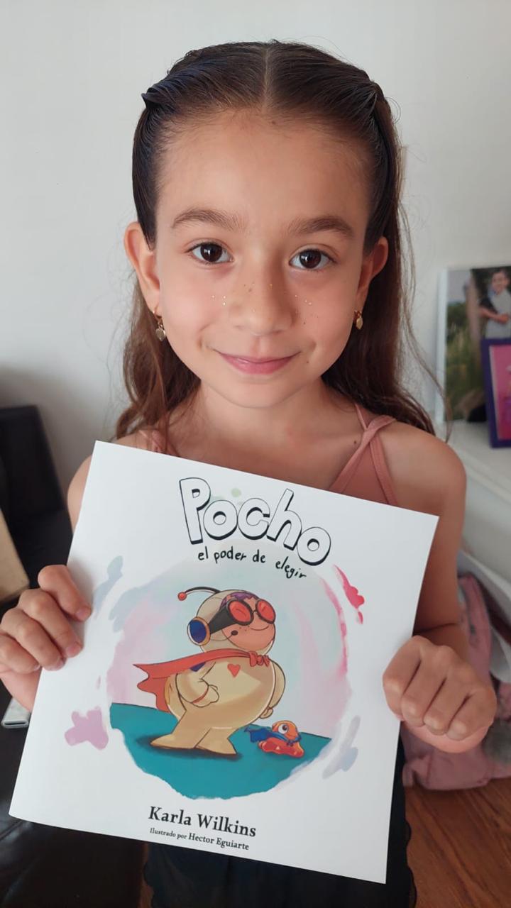 Girl holding the Pocho book
